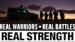 Shadowy image of five soldiers standing outside next to a tank in the dark. Text reads: "Real Warriors, Real Battles, Real Strength."