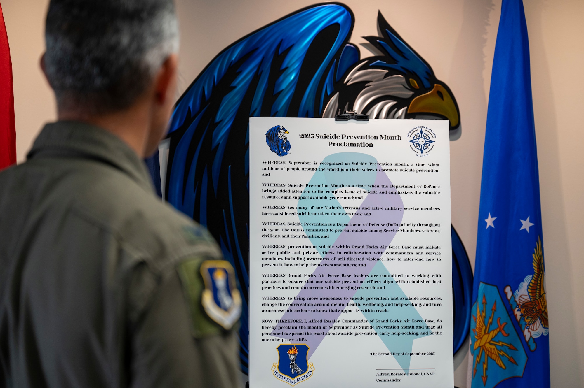 Col. Alfred Rosales, 319th Reconnaissance Wing commander, reads the 2025 Suicide Prevention Month Proclamation at Grand Forks Air Force Base, North Dakota, Aug. 25, 2025.