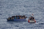A law enforcement boat crew from USCGC Spencer (WMEC 905) intercepts an overloaded vessel with 191 Haitian aliens approximately 40 miles north of Cap Haitian, Haiti, Aug 29, 2025. All aliens aboard the vessel were repatriated back to Haiti, Sept 2, 2025 following the interdiction. (U.S. Coast Guard photo)
