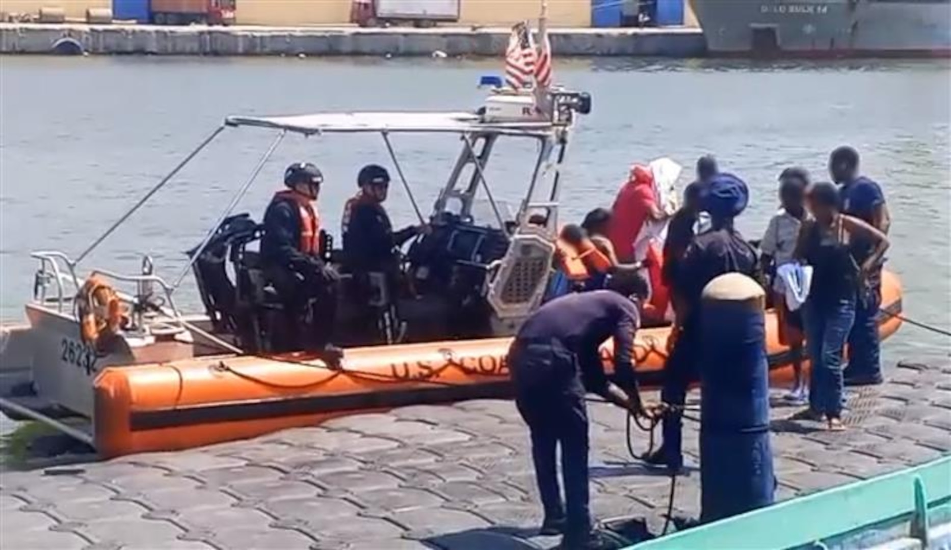 A law enforcement boat crew assigned to USCGC Spencer (WMEC 905) conduct a repatriation of Haitian aliens back to Haiti, Sept. 2, 2025. The aliens were interdicted by Spencer's law enforcement crews approximately 40 miles north of Cap Haitian, Haiti, Aug 29, 2025. (U.S. Coast Guard photo)
