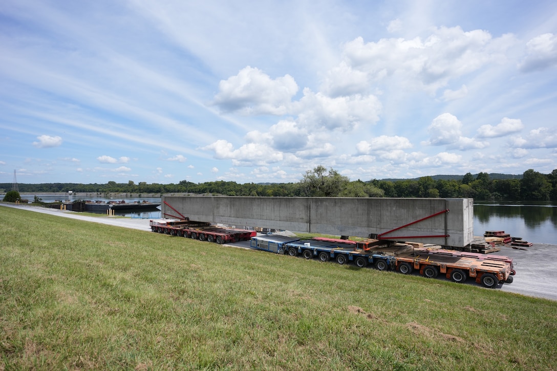 SPRING CITY, Tenn. — A prefabricated wall beam awaits barge delivery to the Chickamauga Lock Replacement Project’s upstream approach wall contract near Watts Bar Dam Aug. 28, 2025. (USACE photo by Noe Gonzalez)