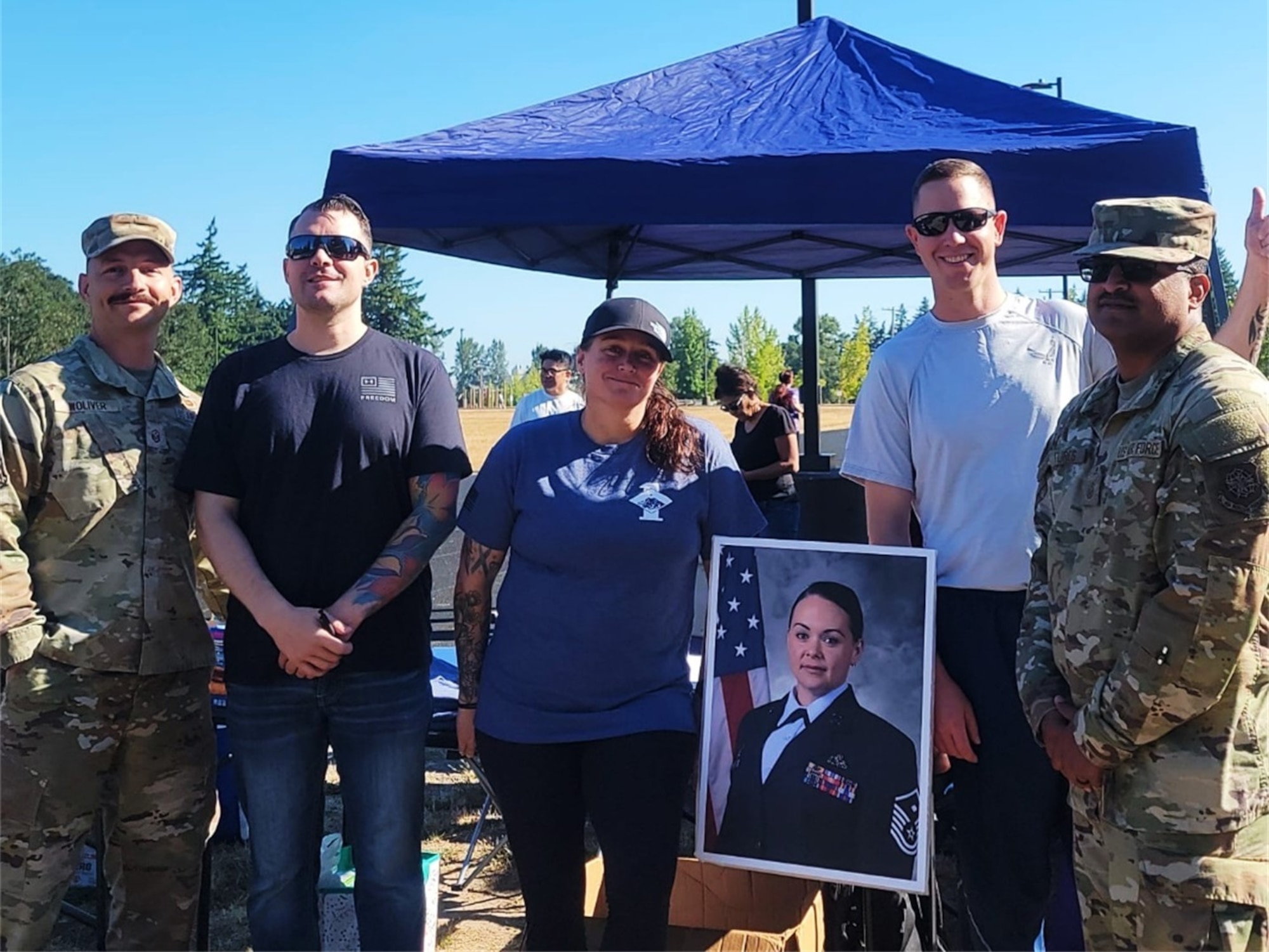A group of Team McChord first sergeants stand together in support of the Dash for Danielle event at Joint Base Lewis-McChord, Washington, Aug. 8, 2025.