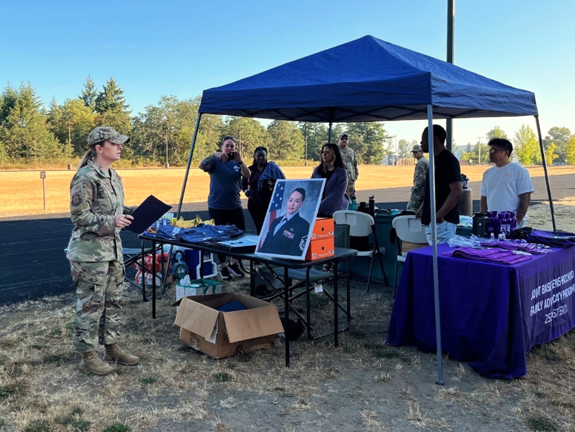 U.S. Air Force Chief Master Sgt. Kristy Korchak-Campbell, 62d Airlift Wing command chief, gives remarks during the Dash for Danielle event at Joint Base Lewis-McChord, Washington, Aug. 8, 2025.