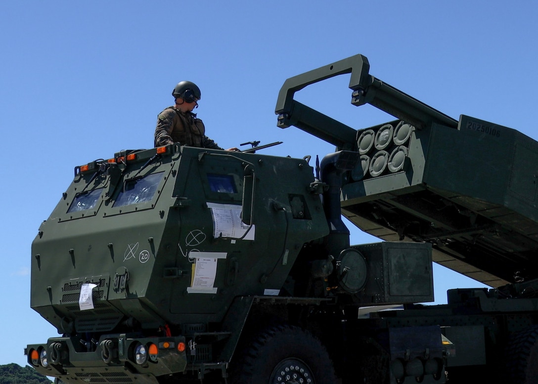 U.S. Marines with Hotel Battery, 31st Marine Expeditionary Unit, ready an M142 High Mobility Artillery Rocket System after offloading a U.S. Air Force, MC-130J Commando II, assigned to 1st Special Operations Wing, during a loading exercise at Kadena Air Base, Okinawa, Japan, Aug 27, 2025.