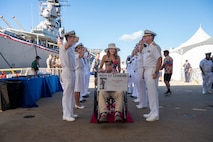 World War II Navy veteran Jim Tucker is welcomed during a ceremony commemorating the 80th anniversary of the end of World War II in Pearl Harbor, Hawaii, Sept. 2, 2025.