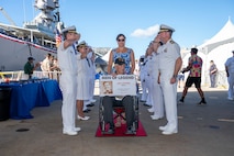 World War II Navy veteran Jack Stowe is welcomed during a ceremony commemorating the 80th anniversary of the end of World War II in Pearl Harbor, Hawaii, Sept. 2, 2025.