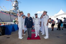 World War II Navy veteran Gunner's Mate 2nd Class Edgar Buffman is welcomed during a ceremony commemorating the 80th anniversary of the end of World War II in Pearl Harbor, Hawaii, Sept. 2, 2025.