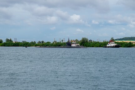 NAVAL BASE GUAM (August 31, 2025) The Los Angeles-class fast-attack submarine USS Springfield (SSN 761) transits Apra Harbor, Naval Base Guam, returning to its homeport after completing a routine deployment in the Indo-Pacific, Aug. 31. Assigned to Commander, Submarine Squadron 15, based at Polaris Point, Naval Base Guam, the Springfield is one of five forward-deployed fast-attack submarines. Renowned for their unparalleled speed, endurance, stealth, and mobility, fast-attack submarines are the backbone of the Navy’s submarine force. Regarded as apex predators of the sea, Guam’s fast-attack submarines serve at the tip of the spear, helping to reaffirm the submarine force's forward-deployed presence in support of a free and open Indo-Pacific. (U.S. Navy photo by Lt. James Caliva)