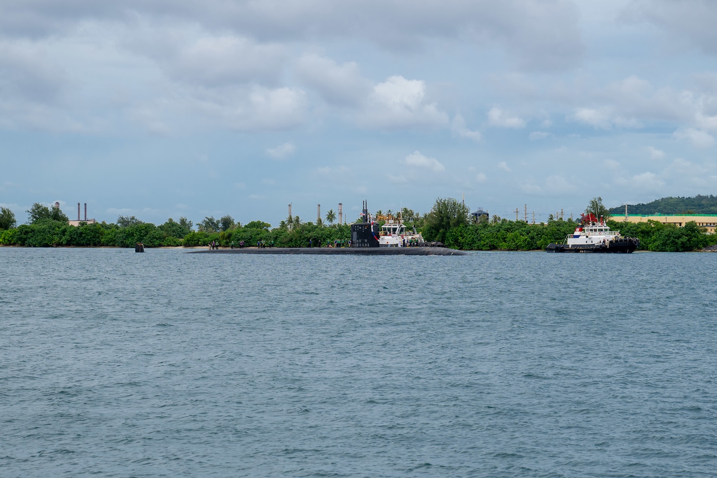 NAVAL BASE GUAM (August 31, 2025) The Los Angeles-class fast-attack submarine USS Springfield (SSN 761) transits Apra Harbor, Naval Base Guam, returning to its homeport after completing a routine deployment in the Indo-Pacific, Aug. 31. Assigned to Commander, Submarine Squadron 15, based at Polaris Point, Naval Base Guam, the Springfield is one of five forward-deployed fast-attack submarines. Renowned for their unparalleled speed, endurance, stealth, and mobility, fast-attack submarines are the backbone of the Navy’s submarine force. Regarded as apex predators of the sea, Guam’s fast-attack submarines serve at the tip of the spear, helping to reaffirm the submarine force's forward-deployed presence in support of a free and open Indo-Pacific. (U.S. Navy photo by Lt. James Caliva)