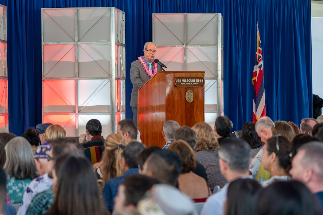 Michael Carr, president and chief executive officer of the USS Missouri Memorial Association, moderates a ceremony commemorating the 80th anniversary of the end of World War II in Pearl Harbor, Hawaii, Sept. 2, 2025.