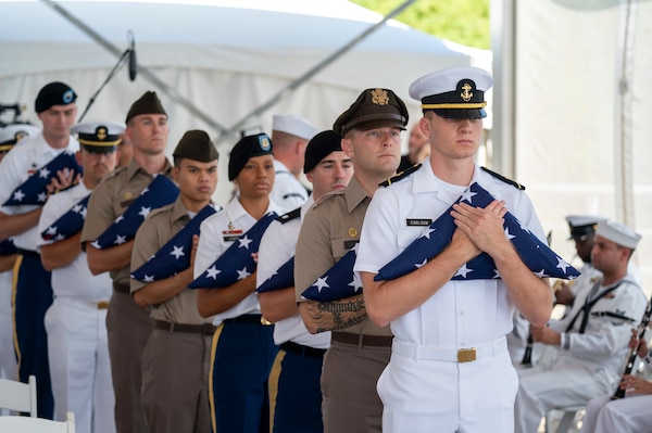Members of the Hawaii Army and Navy Reserve Officers' Training Corps conduct a flag presentation during a ceremony commemorating the 80th anniversary of the end of World War II in Pearl Harbor, Hawaii, Sept. 2, 2025.