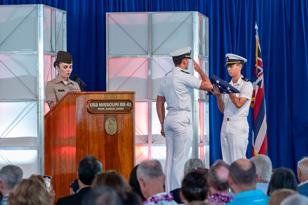 Members of the Hawaii Army and Navy Reserve Officers' Training Corps perform Old Glory during a ceremony commemorating the 80th anniversary of the end of World War II in Pearl Harbor, Hawaii, Sept. 2, 2025.