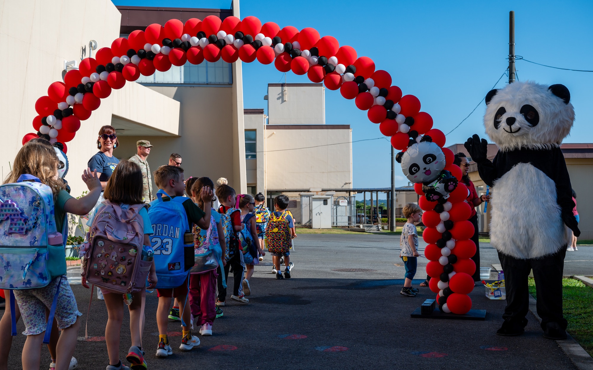 Students begin their first day of universal pre-kindergarten at Joan K. Mendel Elementary School on Yokota Air Base, Japan.