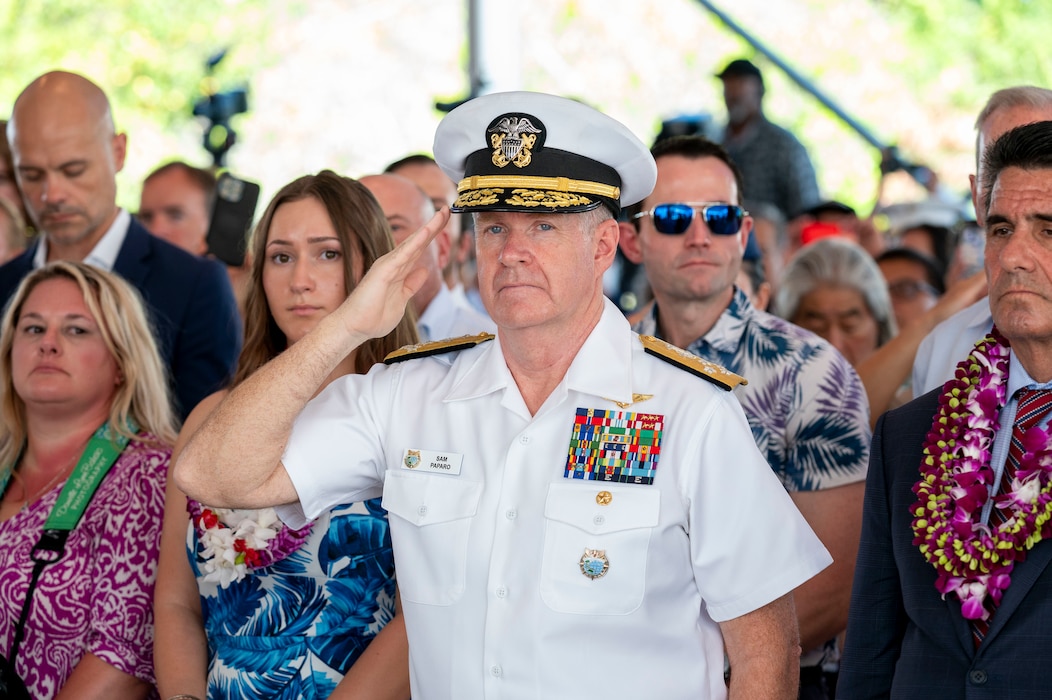 Adm. Samuel J. Paparo, commander of U.S. Indo-Pacific Command renders a hand salute during a rifle salute conducted at a ceremony commemorating the 80th anniversary of the end of World War II in Pearl Harbor, Hawaii, Sept. 2, 2025.