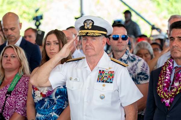 Adm. Samuel J. Paparo, commander of U.S. Indo-Pacific Command renders a hand salute during a rifle salute conducted at a ceremony commemorating the 80th anniversary of the end of World War II in Pearl Harbor, Hawaii, Sept. 2, 2025.