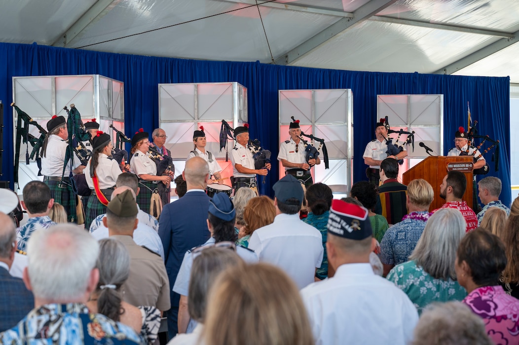 Celtic Pipes and Drums of Hawaii perform Amazing Grace during a ceremony commemorating the 80th anniversary of the end of World War II in Pearl Harbor, Hawaii, Sept. 2, 2025.
