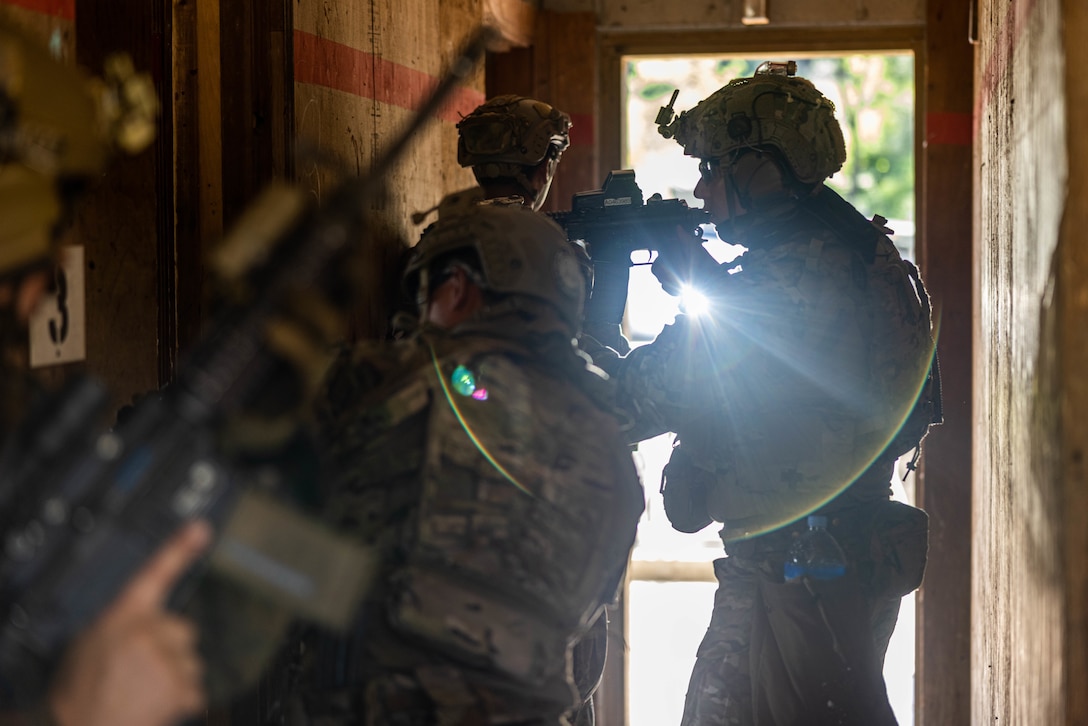 U.S. Marines and Navy Sailors with Explosive Ordnance Disposal Company, 9th Engineer Support Battalion, 3rd Marine Logistics Group, and EOD Mobile Unit One, EOD Group One, forward-deployed with Commander, Task Group 75.1, respectively, clear a room during naval integrated small team close quarters battle tactics training at the Combined Arms Collective Training Facility during Korean Marine Exchange Program 25.2 on Rodriguez Live Fire Complex, South Korea, July 29, 2025. KMEP is a semiannual bilateral exercise that brings together ROK and U.S. Marine Corps units to enhance combined capabilities and combat readiness, strengthen the ROK-U.S. alliance, and reinforce regional stability and deterrence on the Korean Peninsula and across the Indo-Pacific. (U.S. Marine Corps photo by Sgt. Paley Fenner)