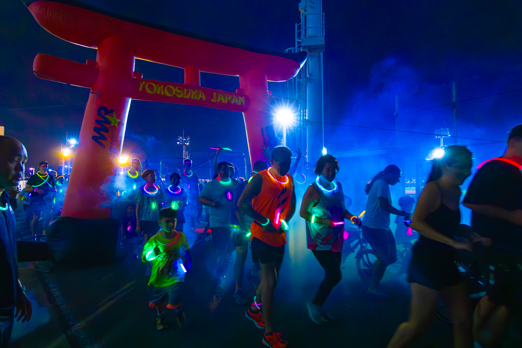 Commander, Fleet Activities Yokosuka's Morale, Welfare and Recreation (CFAY MWR) hosted the annual Glow Run outside Purdy Fitness Center August 15, 2025.