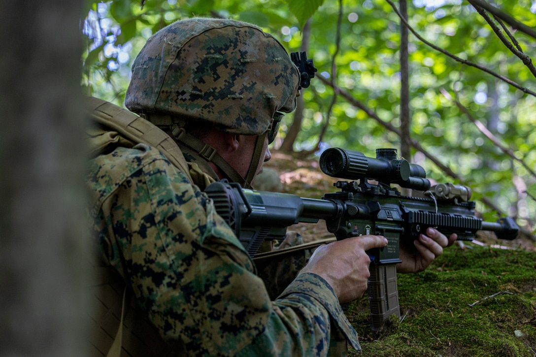 U.S. Marine Corps Lance Cpl. Zachary Hager, a rifleman with Charlie Company, 1st Battalion, 24th Marine Regiment, 4th Marine Division, provides security during an offensive raid training event for training exercise Northern Strike 25-2 at Camp Grayling, Michigan, Aug. 9, 2025. Northern Strike, held Aug. 2 to 16, 2025, is designed to validate readiness of Joint Reserve forces at the National All-Domain Warfighting Center. This year's iteration featured approximately 7,500 participants. (U.S. Marine Corps photo by Cpl. Aaron TorresLemus)