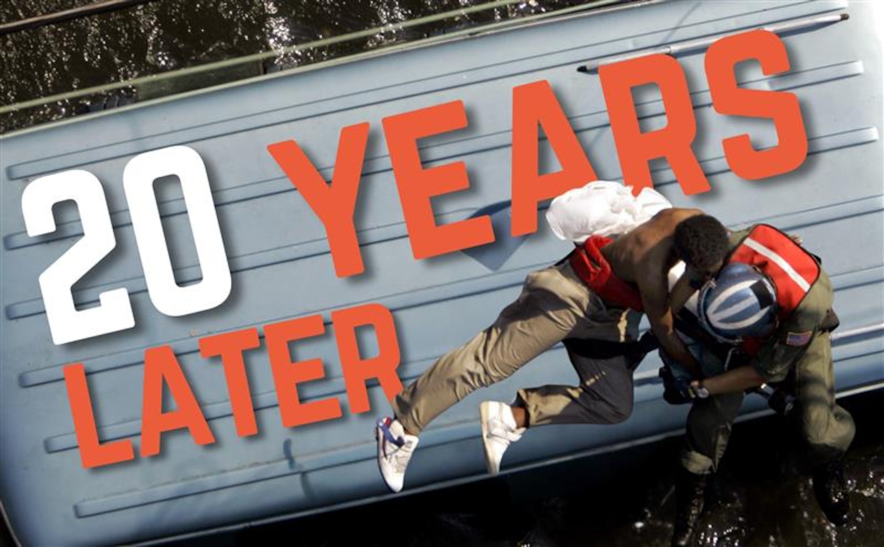 The words 20 Years Later are shown on the top of a bus. In the foreground, a Coast Guard rescue swimmer is hoisting a survivor during Hurricane Katrina.