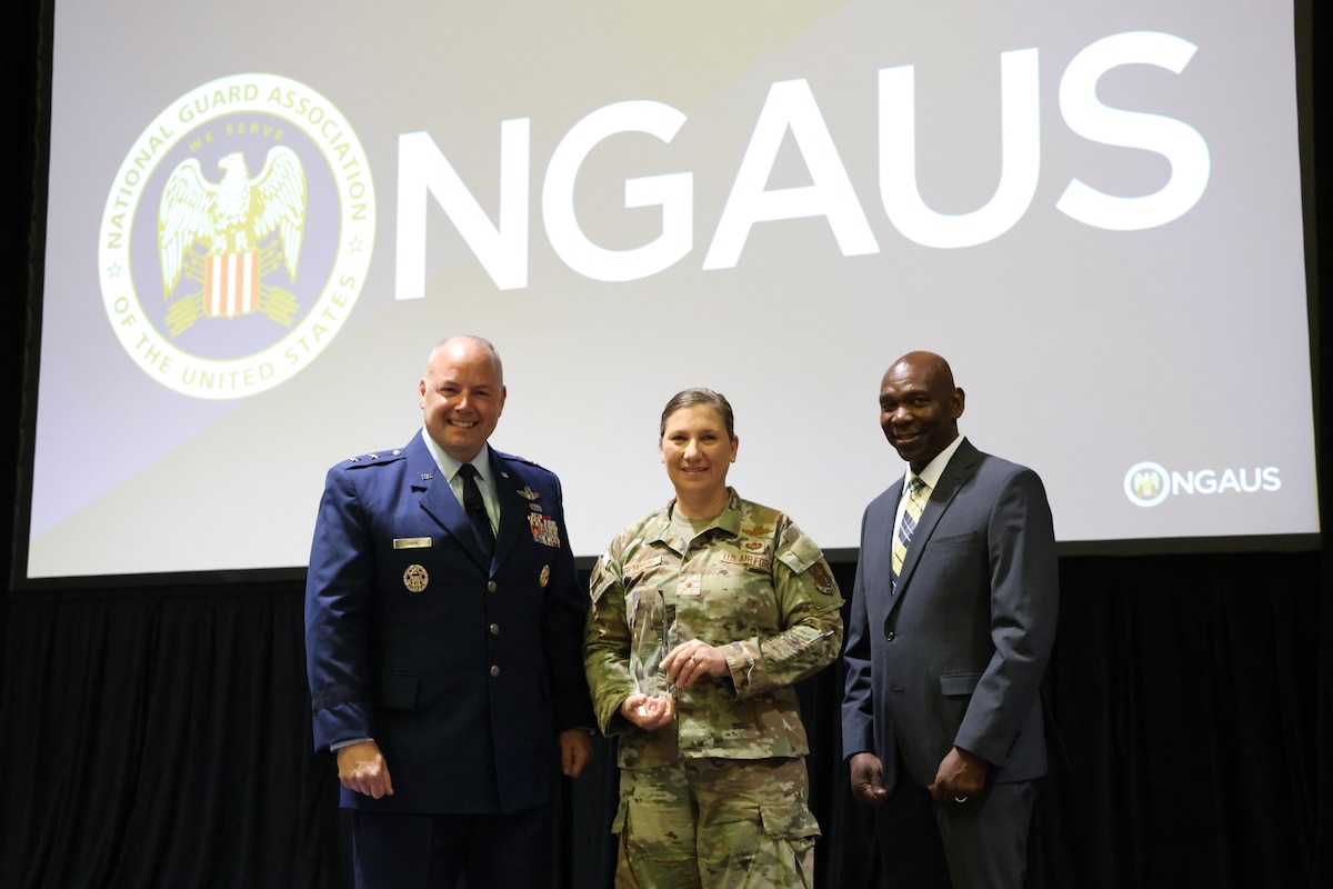 U.S. Air National Guard Maj. Gen. Duke A. Pirak (left), acting director of the Air National Guard and Maj. Gen. (retired) Ondra Berry (right), vice chair-Air of the National Guard Association of the United States, presents the Air National Guard Spaatz Trophy to Maryland Air National Guard Brig. Gen. Amy P. Kremser (middle), director of joint staff for the Maryland National Guard, at the 147th National Guard Association of the United States General Conference and Exhibition at the Baird Center in Milwaukee, August 25, 2025. The 175th Wing was awarded the Air National Guard Spaatz Trophy, presented in honor of Gen. Carl A. Spaatz, the first Chief of Staff of the U.S. Air Force. (Courtesy Photo by Drake Sorey)