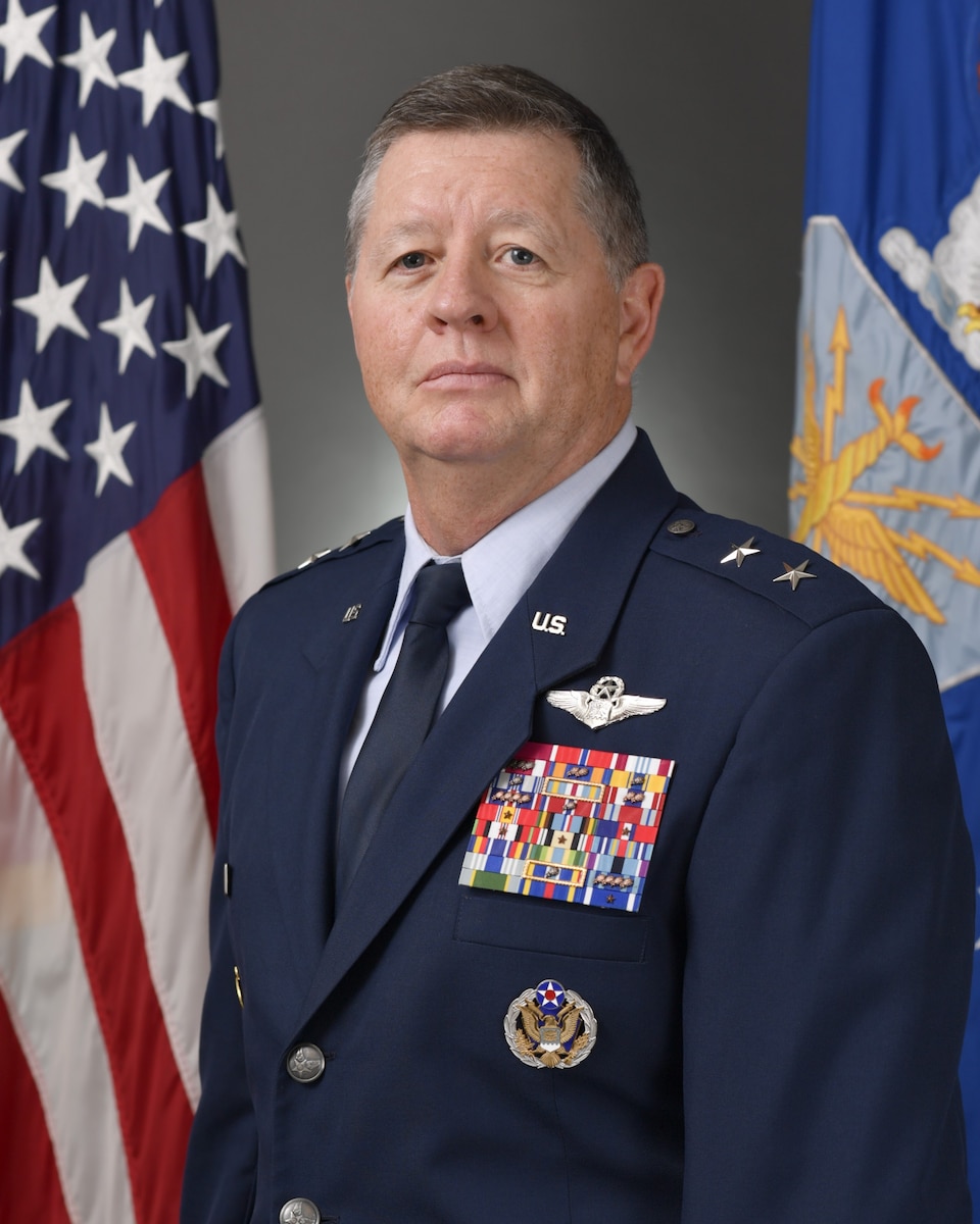 A military member poses for a portrait.