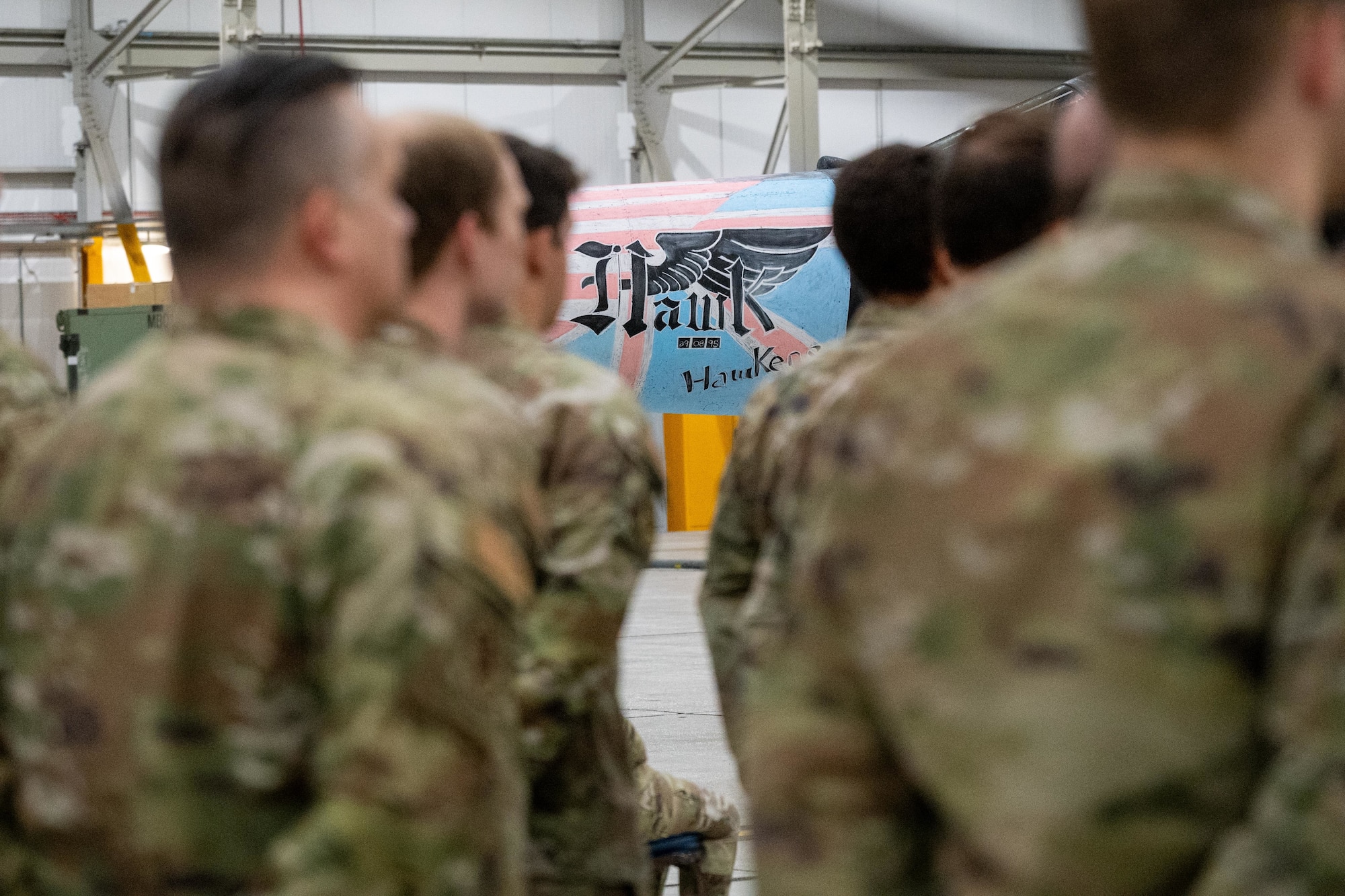Airmen stand in formation during the 30th anniversary remembrance of Capt. David “Hawk” Hawkens