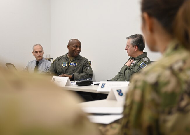 U.S. Air Force Col. Henry Jeffress, Air Forces Southern deputy commander, left, speaks with Chilean Air Force (FACh) Maj. Gen. Alfredo Ríos, FACh director of operations, right, during their annual Airman-to-Airman Talks at Davis-Monthan Air Force Base, Arizona, Aug. 27, 2025. Jeffress and Ríos discussed mutual interests to strengthen U.S.–FACh ties through enhanced security cooperation. (U.S. Air Force photo by Staff Sgt. Abbey Rieves)