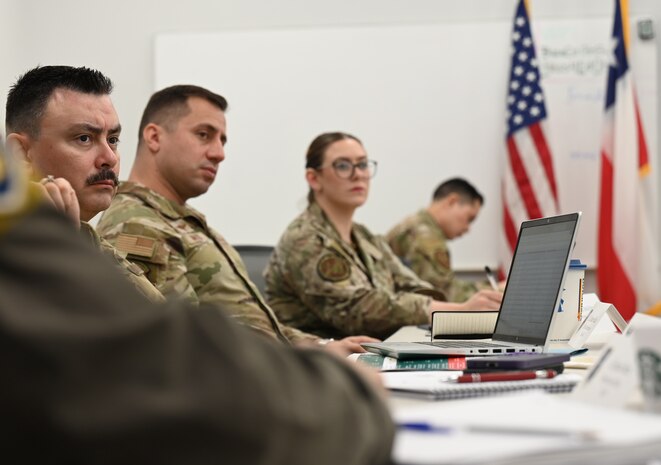 Service members from Air Forces Southern, Headquarters Air Force Operations (HAF/A3), Texas Air National Guard (TXANG), and the Chilean Air force (FACh) gather for the 2025 Airman-to-Airman Talks at Davis-Monthan Air Force Base, Arizona, Aug. 27, 2025. The A2A Talks aimed to foster long-term professional relationships, facilitate idea exchange, and share lessons learned and best practices between the U.S. and Chilean Air Forces. (U.S. Air Force photo by Staff Sgt. Abbey Rieves)