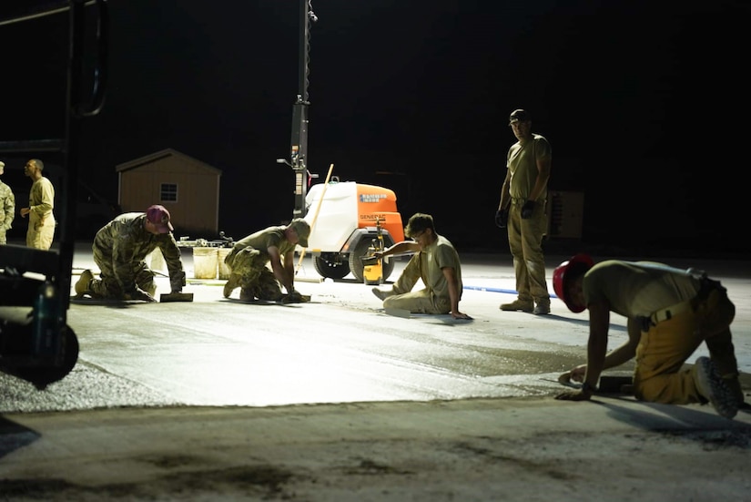 Airmen assigned to the 139th Civil Engineer Squadron, Missouri Air National Guard, construct a mock runway at Fort Indiantown Gap, Pennsylvania, Aug. 18, 2025. The site will be used for Rapid Airfield Damage Recovery training by civil engineers across the Air National Guard. (U.S. Air National Guard photo by Staff Sgt. Keenan Aitchison)