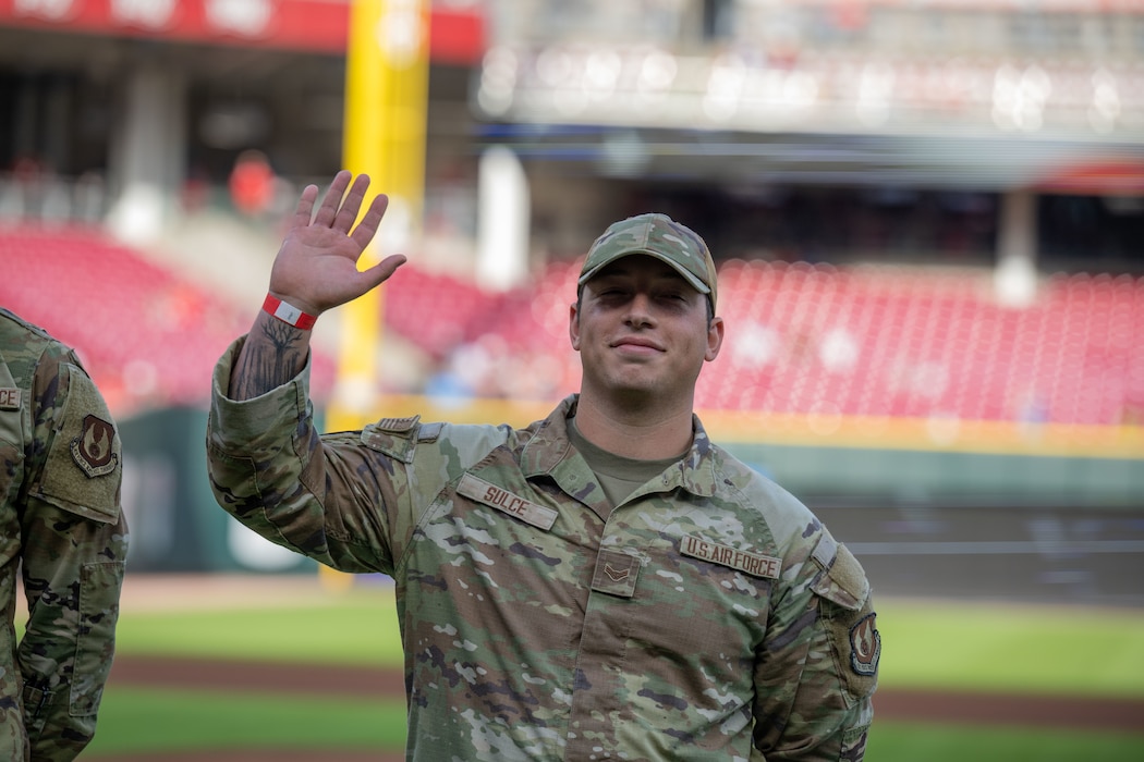 Airman 1st Class Ergi Sulce takes the field to be recognized as the Honorary Captain for the Cincinnati Reds at Great American Ball Park, Aug. 29, 2025. The event was part of the Reds’ annual Military Appreciation Night. (U.S. Air Force photo by Jack Gardner)
