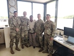 Pennsylvania Air National Guardsmen with the 258th Combat Airfield Operations Squadron out of Johnstown, Pennsylvania, pose for a photo at Palau’s International Airport with the local liaison officer during Exercise Resolute Force Pacific 2025 Aug.13, 2025. The 258th Combat Airfield Operations Squadron is a geographically separated unit of the 171st Air Refueling Wing and serves an essential mission by providing air traffic control services both stateside and overseas to civil, military, and even presidential aircraft while also maintaining mobile readiness to deploy. (U.S. Air National Guard Photo)