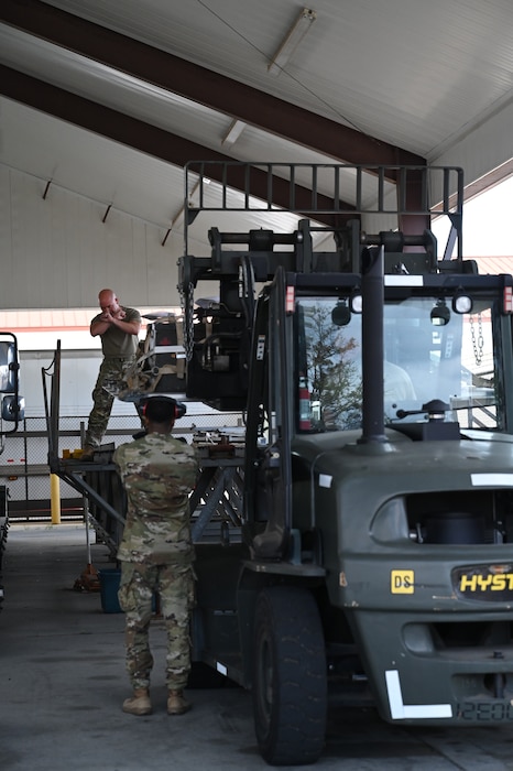people load cargo