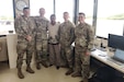 Pennsylvania Air National Guardsmen with the 258th Combat Airfield Operations Squadron out of Johnstown, Pennsylvania, pose for a photo at Palau’s International Airport with the local liaison officer during Exercise Resolute Force Pacific 2025 Aug.13, 2025. The 258th Combat Airfield Operations Squadron is a geographically separated unit of the 171st Air Refueling Wing and serves an essential mission by providing air traffic control services both stateside and overseas to civil, military, and even presidential aircraft while also maintaining mobile readiness to deploy. (U.S. Air National Guard Photo)