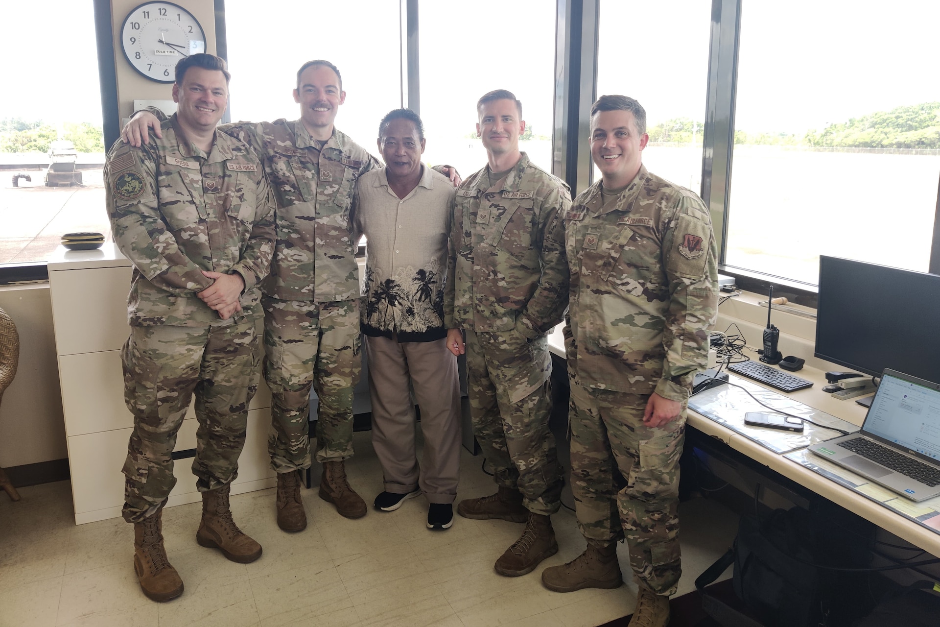 Pennsylvania Air National Guardsmen with the 258th Combat Airfield Operations Squadron out of Johnstown, Pennsylvania, pose for a photo at Palau’s International Airport with the local liaison officer during Exercise Resolute Force Pacific 2025 Aug.13, 2025. The 258th Combat Airfield Operations Squadron is a geographically separated unit of the 171st Air Refueling Wing and serves an essential mission by providing air traffic control services both stateside and overseas to civil, military, and even presidential aircraft while also maintaining mobile readiness to deploy. (U.S. Air National Guard Photo)