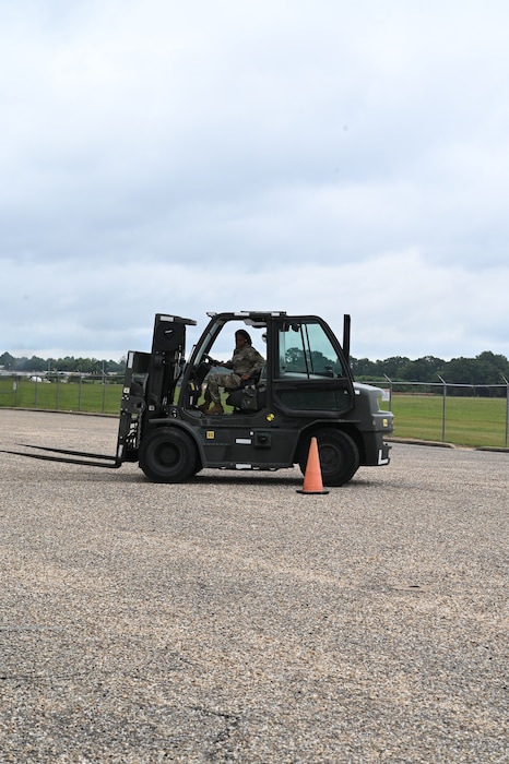 a person drives a forklift