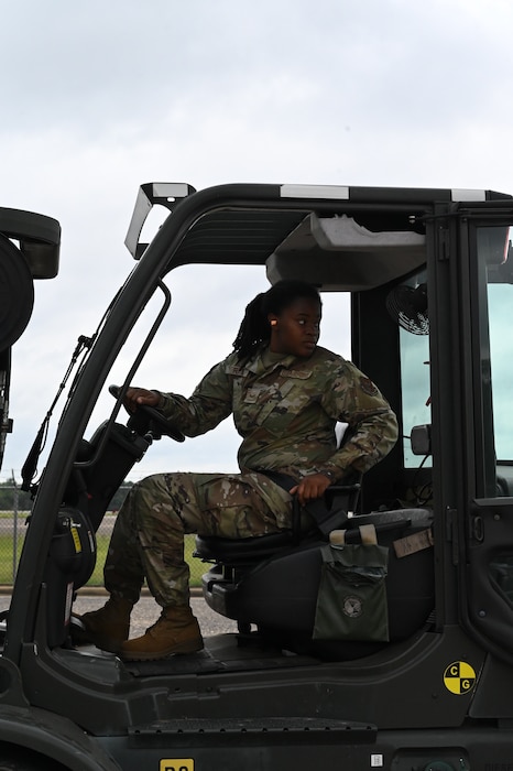 a person drives a forklift