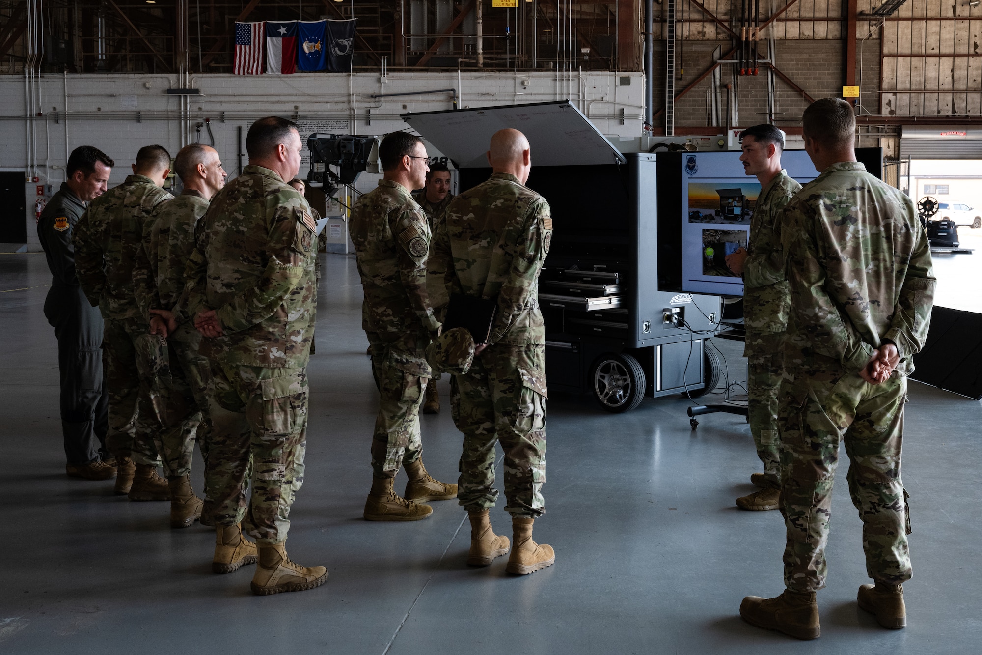 Airmen from the 317th Maintenance Squadron provide a Rapid Expeditionary Kit demonstration to Gen. Johnny Lamontagne, Air Mobility Command commander at Dyess Air Force Base, Texas, Aug. 27, 2025. The REX Kit is a self-contained communications and mission-support package that provides secure voice, data, and networking tools enabling rapid command and control in dispersed, contested environments. (U.S. Air Force photo by Senior Airman Jade M. Caldwell)