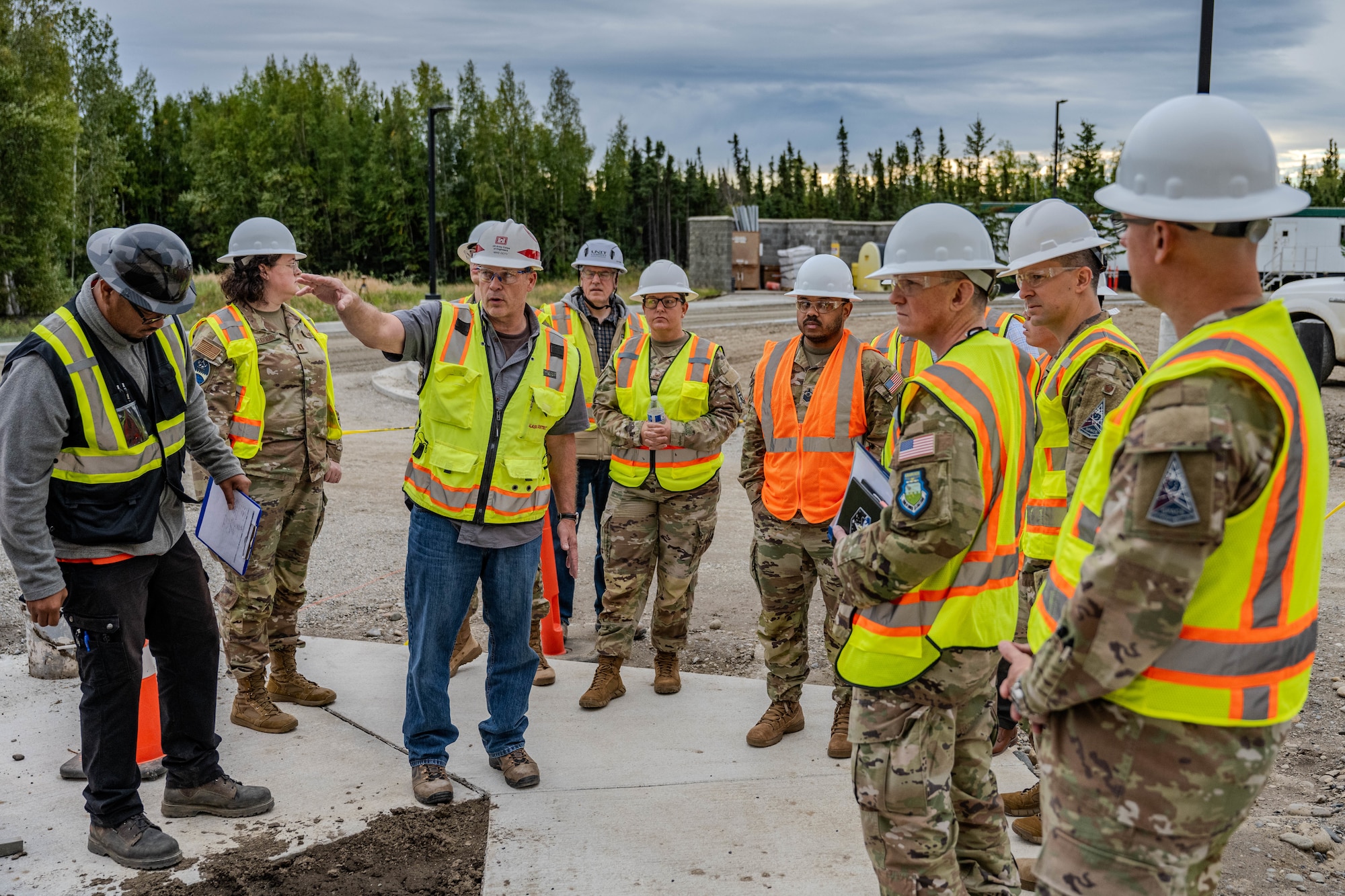 men stand around construction site