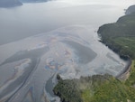 An aircrew from Coast Guard Air Station Kodiak conducts an overflight of a fishing vessel that ran aground in Izhut Bay, Kodiak, Alaska, Sept. 1, 2025. The Coast Guard is responding to the diesel released from the vessel. (U.S. Coast Guard courtesy photo)