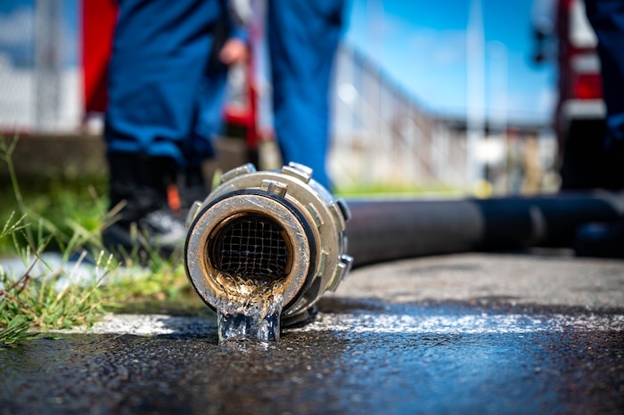 A Hachinohe City Fire Department water line and connection drains during a fuel tank fire drill at Hachinohe City, Japan, Sept. 3, 2025.