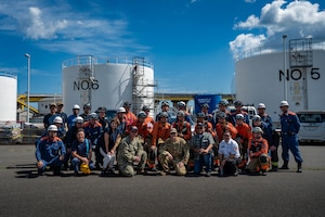 U.S. Air Force firefighters assigned to the 35th Civil Engineer Squadron, U.S. Navy members assigned to the Naval Defense Fuel Service Point Hachinohe, and Hachinohe City Fire Department firefighters, pose together for a group photo at Hachinohe City, Japan, Sept. 3, 2025