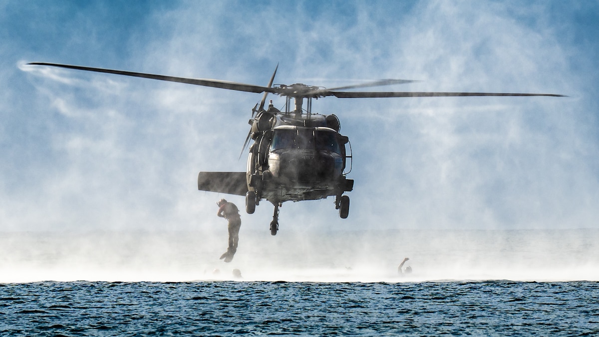U.S. Air Force special tactics Airmen from the Kentucky Air National Guard’s 123rd Airlift Wing conduct infil operations into the Caribbean Sea from a Mississippi Army National Guard UH-60 Black Hawk off the coast of St. Croix, U.S. Virgin Islands, Aug. 28, 2025 as part of Emerald Warrior 25.2, a large-scale special operations exercise staged in multiple locations by Air Force Special Operations Command. St. Croix provides an ideal environment for testing littoral and maritime capabilities, simulating many of the geographic features that special operators may encounter when deployed around the world to project air power in unfamiliar or contested environments. (U.S. Air National Guard photo by Dale Greer)
