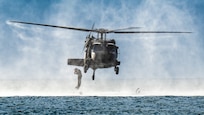 U.S. Air Force special tactics Airmen from the Kentucky Air National Guard’s 123rd Airlift Wing conduct infil operations into the Caribbean Sea from a Mississippi Army National Guard UH-60 Black Hawk off the coast of St. Croix, U.S. Virgin Islands, Aug. 28, 2025 as part of Emerald Warrior 25.2, a large-scale special operations exercise staged in multiple locations by Air Force Special Operations Command. St. Croix provides an ideal environment for testing littoral and maritime capabilities, simulating many of the geographic features that special operators may encounter when deployed around the world to project air power in unfamiliar or contested environments. (U.S. Air National Guard photo by Dale Greer)