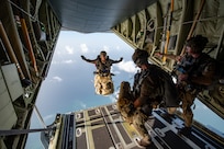 A U.S. Air Force special tactics Airman from the Kentucky Air National Guard’s 123rd Airlift Wing jumps into Henry E. Rohlsen Airport near Christiansted in St. Croix, U.S. Virgin Islands, Aug. 26, 2025 as part of Emerald Warrior 25.2, a large-scale special operations exercise being staged in multiple locations by Air Force Special Operations Command. The Airman, joined by 10 other combat controllers and pararescuemen, took control of the airfield to receive follow-on aircraft in support of simulated combat and contingency operations. (U.S. Air National Guard photo by Phil Speck)