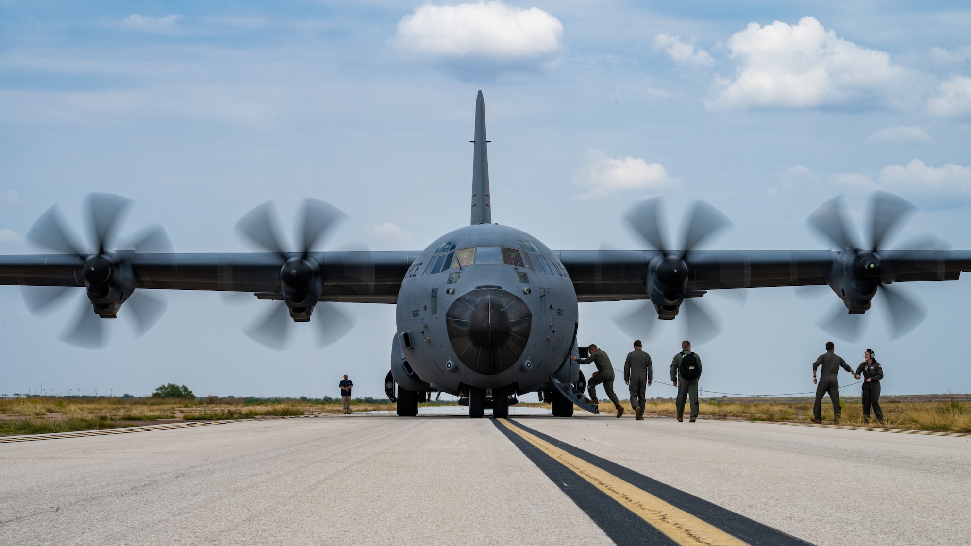 U.S. Air Force Gen. Johnny Lamontagne, Air Mobility Command commander, and Chief Master Sgt. Jamie Newman, AMC command chief, tour the Tye Landing Zone with 317th Airlift Wing leadership at Dyess Air Force Base, Texas, Aug. 26, 2025. Newman and Lamontagne flew with the 317th AW on a C-130J Super Hercules and saw first-hand how the wing supports the command’s global rapid mobility mission. (U.S. Air Force photo by Senior Airman Jade M. Caldwell)