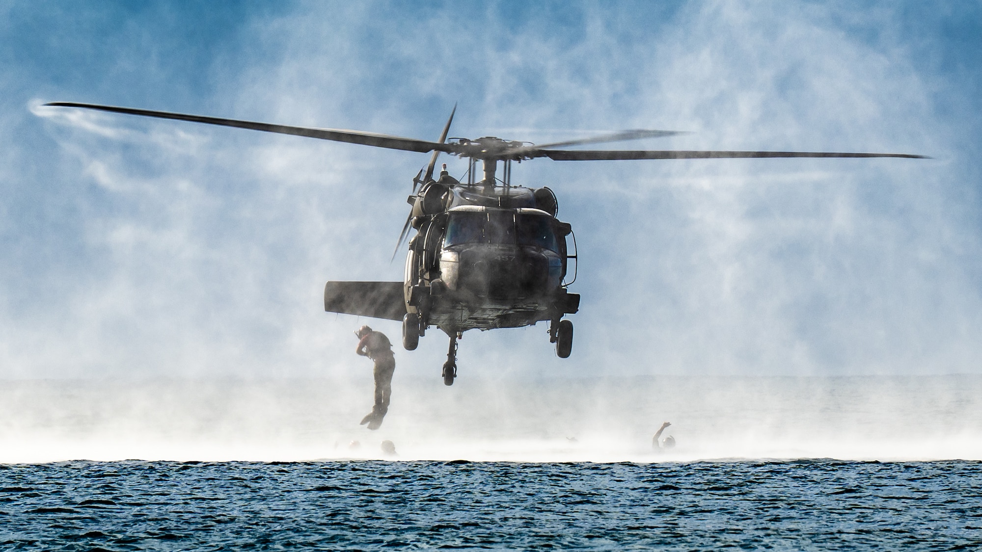 U.S. Air Force special tactics Airmen from the Kentucky Air National Guard’s 123rd Airlift Wing conduct infil operations into the Caribbean Sea from a Mississippi Army National Guard UH-60 Black Hawk off the coast of St. Croix, U.S. Virgin Islands, Aug. 28, 2025 as part of Emerald Warrior 25.2, a large-scale special operations exercise staged in multiple locations by Air Force Special Operations Command. St. Croix provides an ideal environment for testing littoral and maritime capabilities, simulating many of the geographic features that special operators may encounter when deployed around the world to project air power in unfamiliar or contested environments. (U.S. Air National Guard photo by Dale Greer)