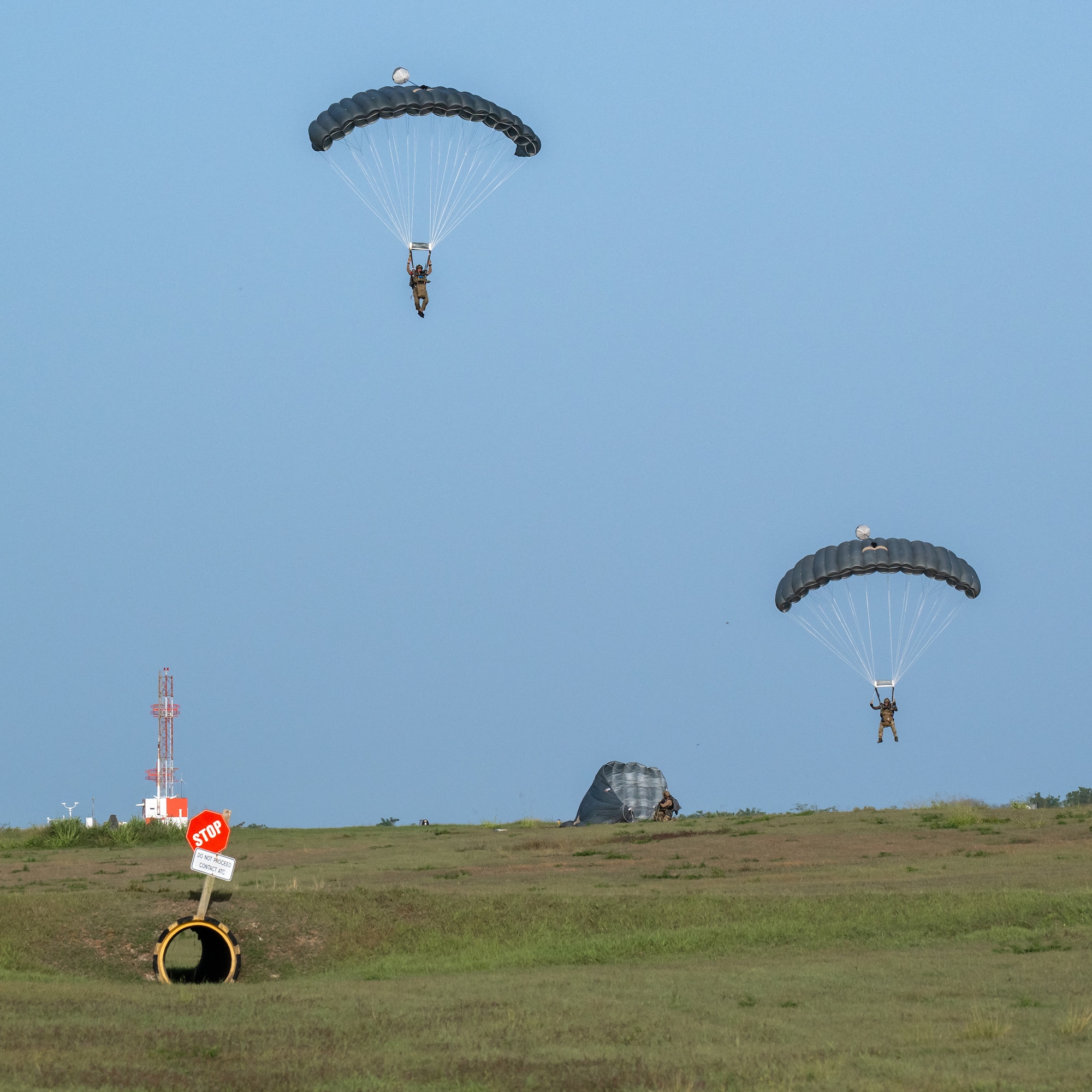 U.S. Air Force special tactics Airmen from the Kentucky Air National Guard’s 123rd Airlift Wing parachute into Henry E. Rohlsen Airport near Christiansted in St. Croix, U.S. Virgin Islands, Aug. 26, 2025 as part of Emerald Warrior 25.2, a large-scale special operations exercise being staged in multiple locations by Air Force Special Operations Command. The Airmen, joined by nine other combat controllers and pararescuemen, took control of the airfield to receive follow-on aircraft in support of simulated combat and contingency operations. (U.S. Air National Guard photo by Dale Greer)