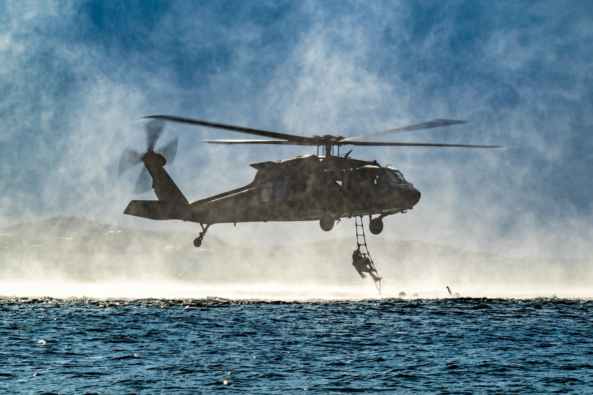 U.S. Air Force special tactics Airmen from the Kentucky Air National Guard’s 123rd Airlift Wing conduct exfil operations from the Caribbean Sea into a Mississippi Army National Guard UH-60 Black Hawk off the coast of St. Croix, U.S. Virgin Islands, Aug. 28, 2025 as part of Emerald Warrior 25.2, a large-scale special operations exercise staged in multiple locations by Air Force Special Operations Command. St. Croix provides an ideal environment for testing littoral and maritime capabilities, simulating many of the geographic features that special operators may encounter when deployed around the world to project air power in unfamiliar or contested environments. (U.S. Air National Guard photo by Dale Greer)