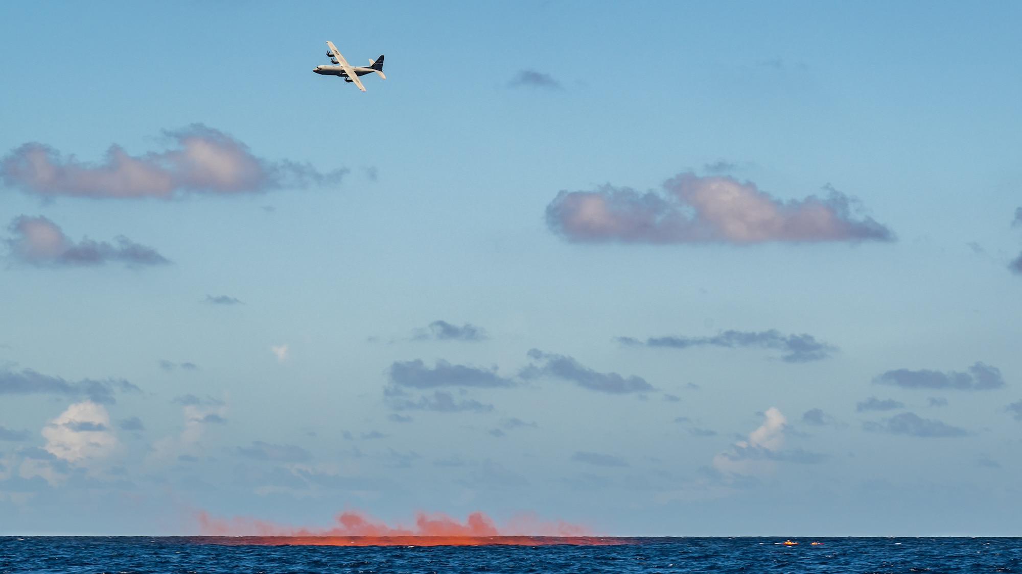 A U.S. Air Force C-130J Super Hercules from the Kentucky Air National Guard’s 123rd Airlift Wing monitors the life rafts of two survivors following a simulated place crash in the Caribbean Sea off the coast of St. Croix, U.S. Virgin Islands, Aug. 29, 2025 as part of Emerald Warrior 25.2, a large-scale special operations exercise staged in multiple locations by Air Force Special Operations Command. St. Croix provides an ideal environment for testing littoral and maritime capabilities, simulating many of the geographic features that Airmen may encounter when deployed around the world to project air power in unfamiliar or contested environments. (U.S. Air National Guard photo by Dale Greer)